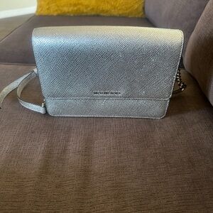 Michael Kors Silver Crossbody Bag
Excellent Condition!  Used once.